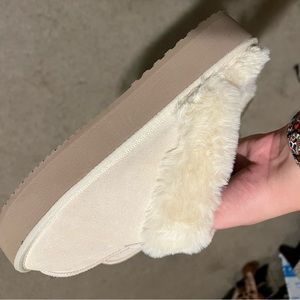 Brand cream slippers.